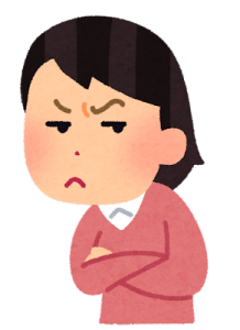 怪しむ女性